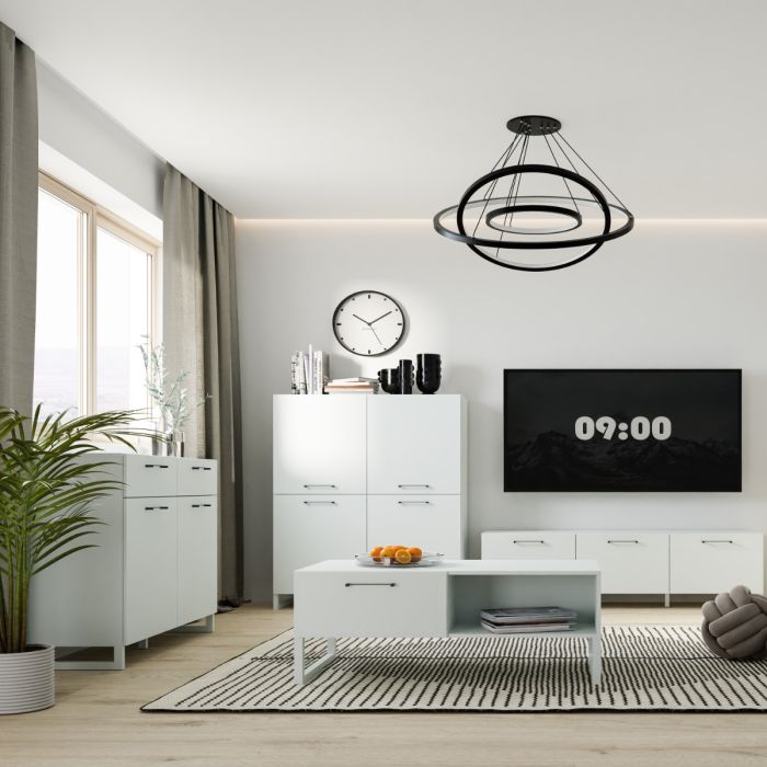 Modern living room with white furniture, a black chandelier, and a TV displaying the time.