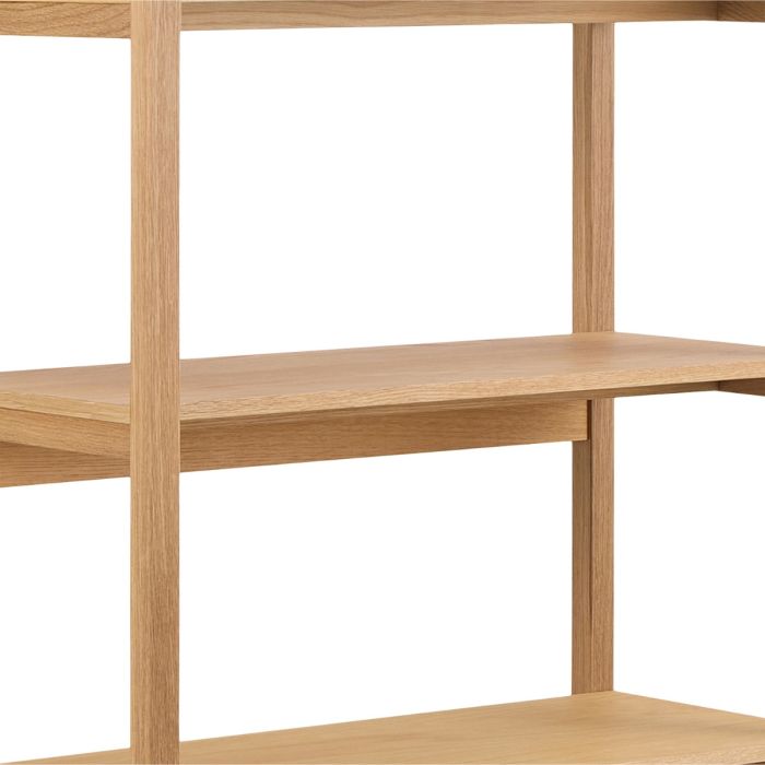 Wooden bookshelf with three shelves on a white background