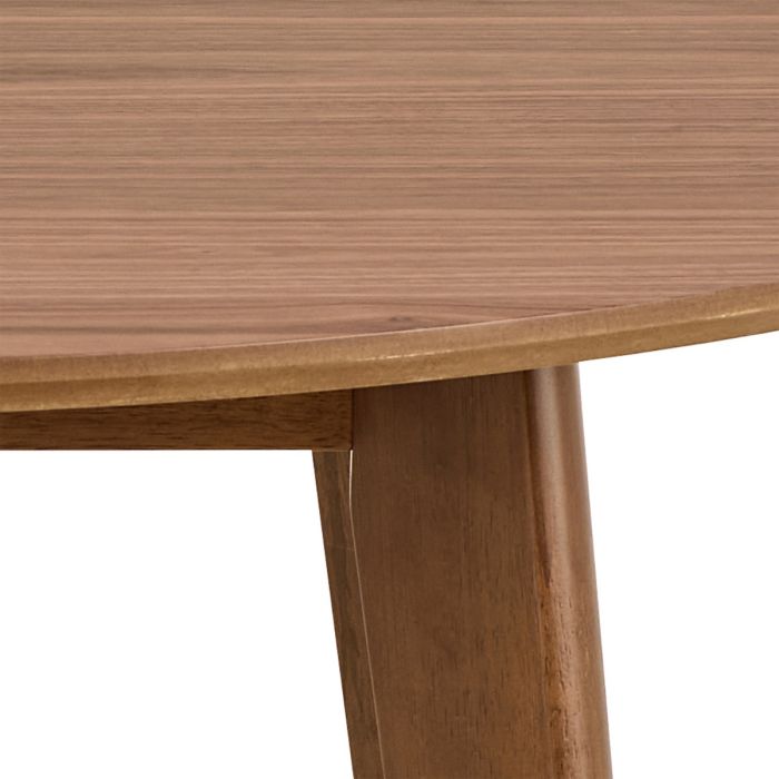 Close-up of a wooden table with a light brown finish on a white background