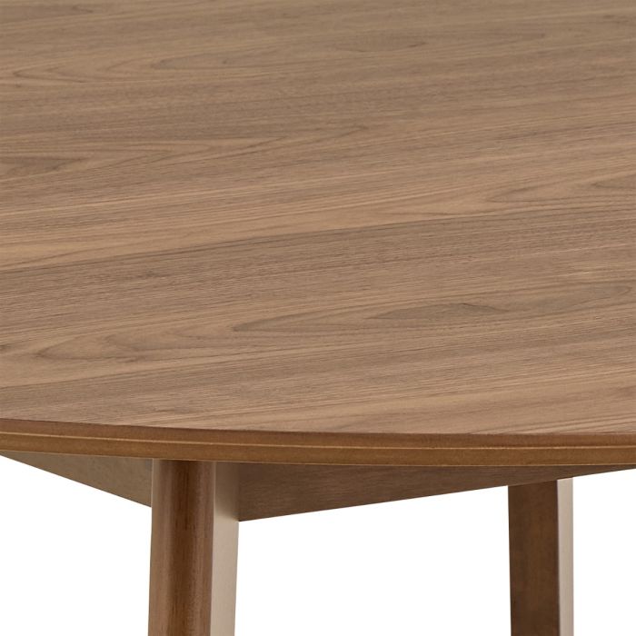 Close-up of a wooden table with a white background