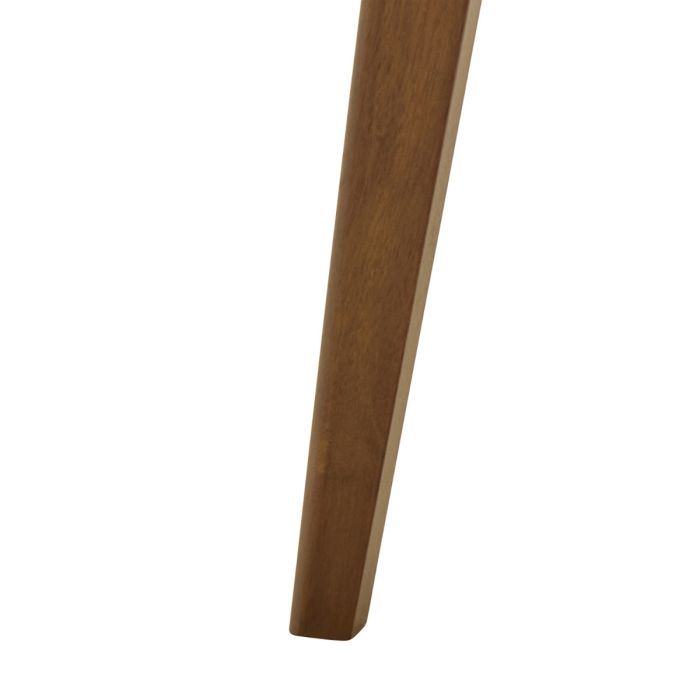 Close-up of a wooden leg on a white background