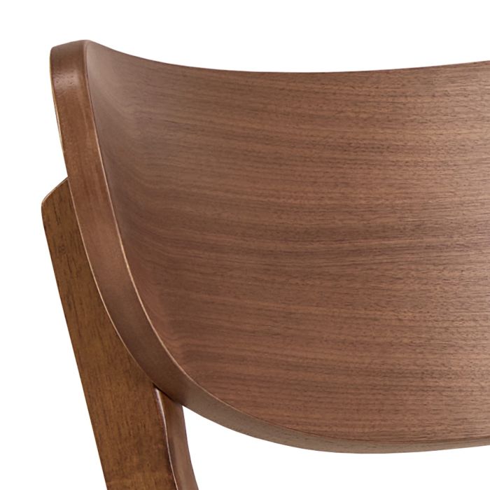 Close-up of a wooden chair seat on a white background