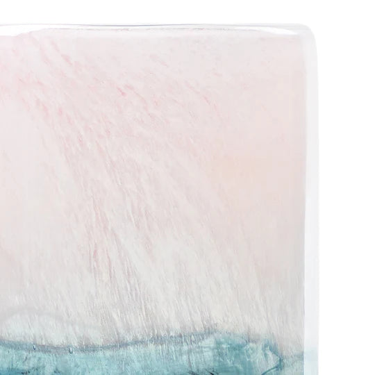 Close-up of a pink and blue gradient fabric texture