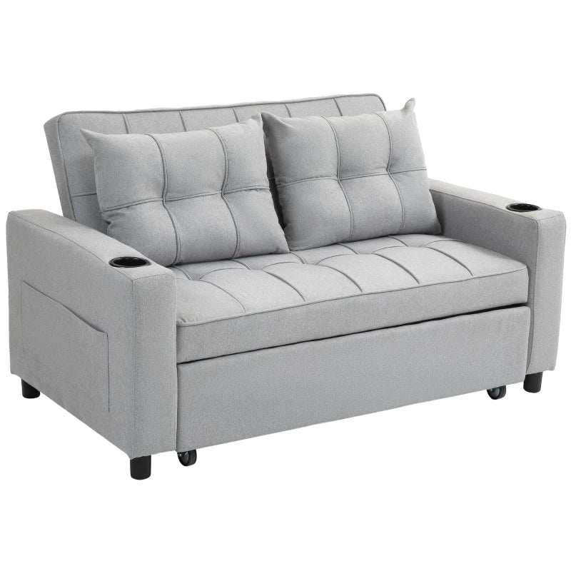 Gray sofa bed with tufted backrest on a white background