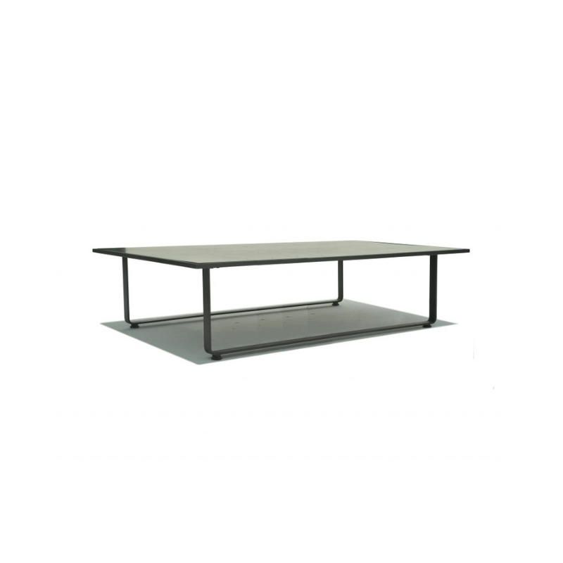 Coffee table with a metal frame and glass top on a white background