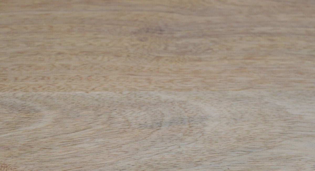Close-up of a wooden surface with a natural grain pattern