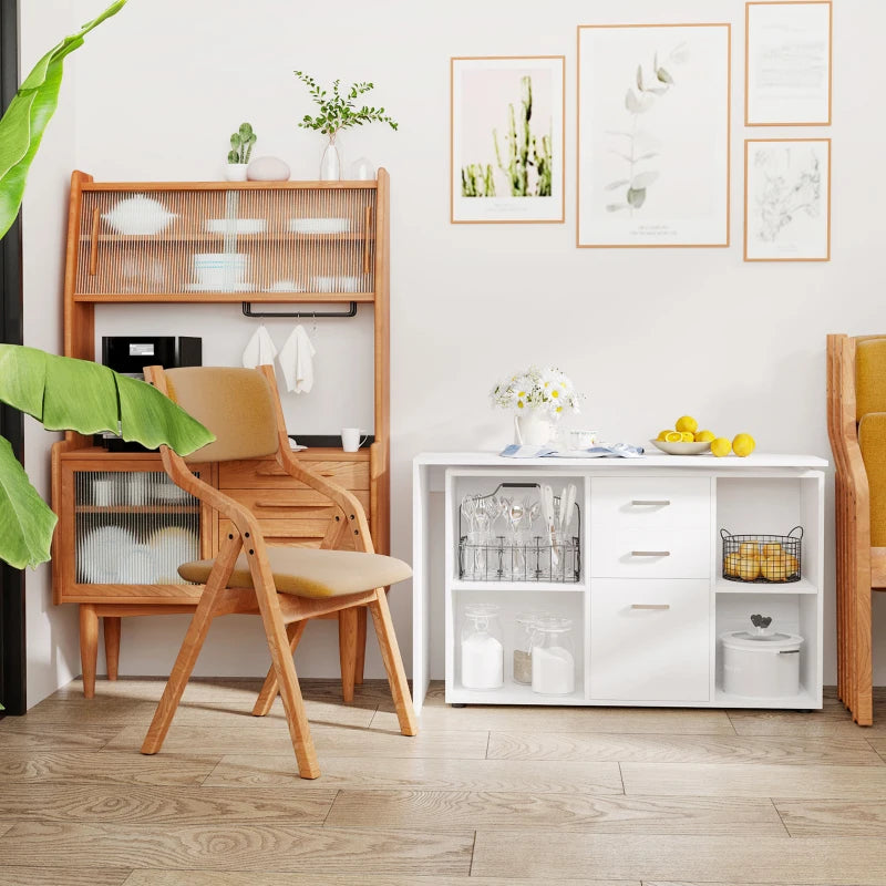 Modern kitchen with wooden cabinets, white shelves, and decorative items.