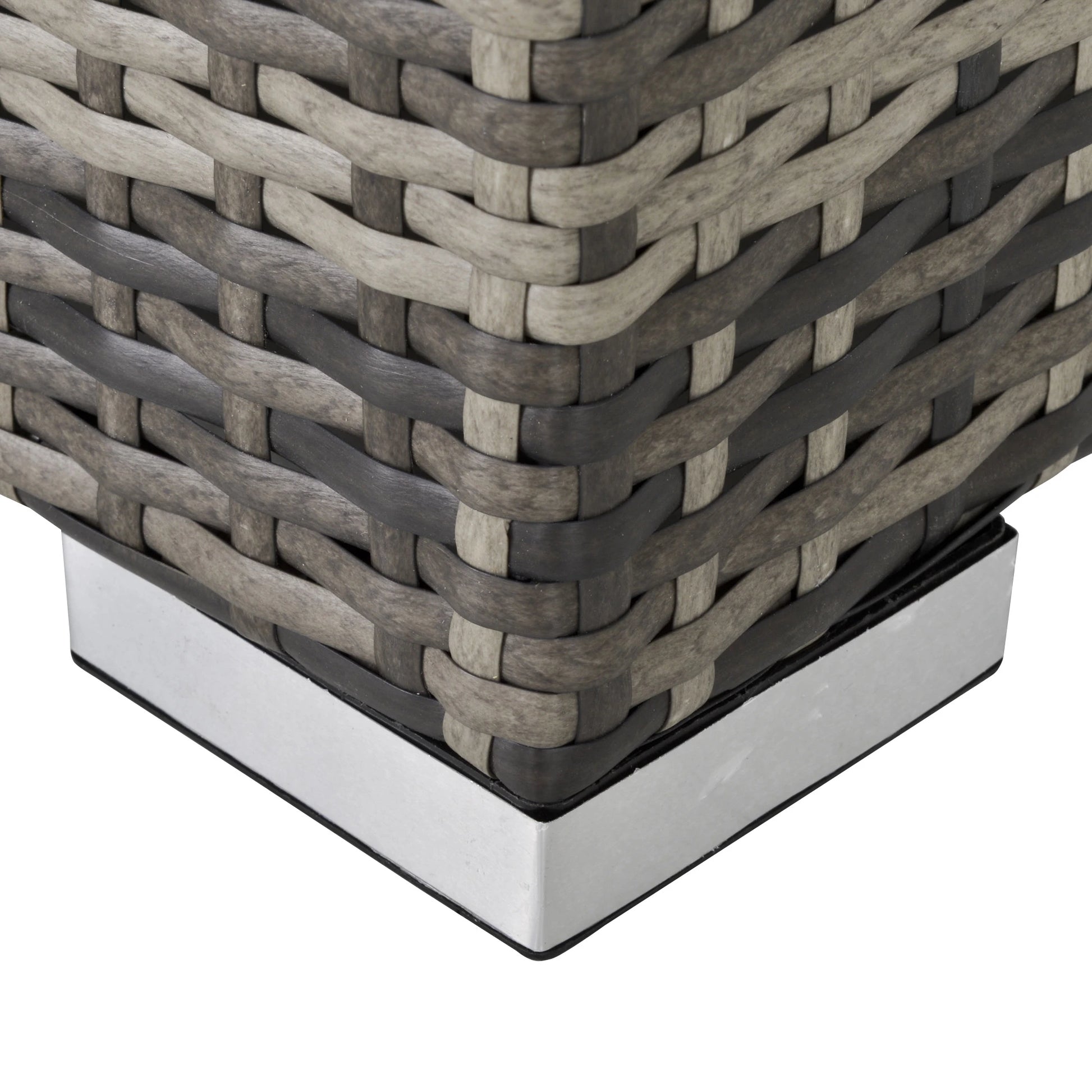 Close-up of a woven outdoor furniture piece with a metal base on a white background