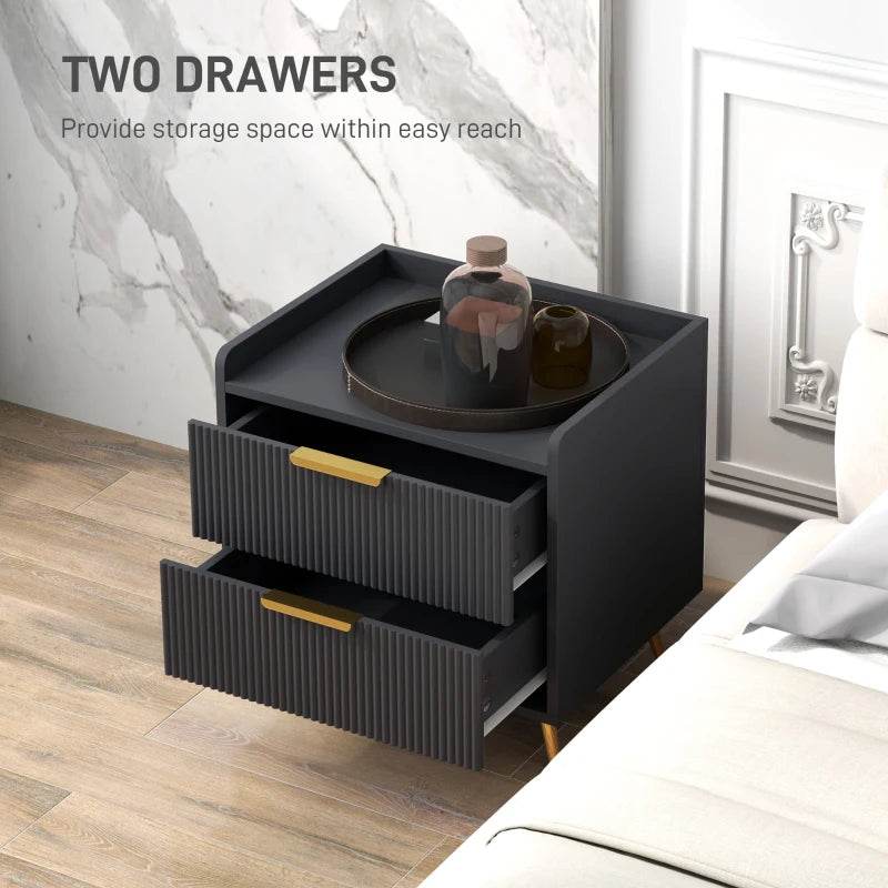 Black nightstand with two drawers in a bedroom setting