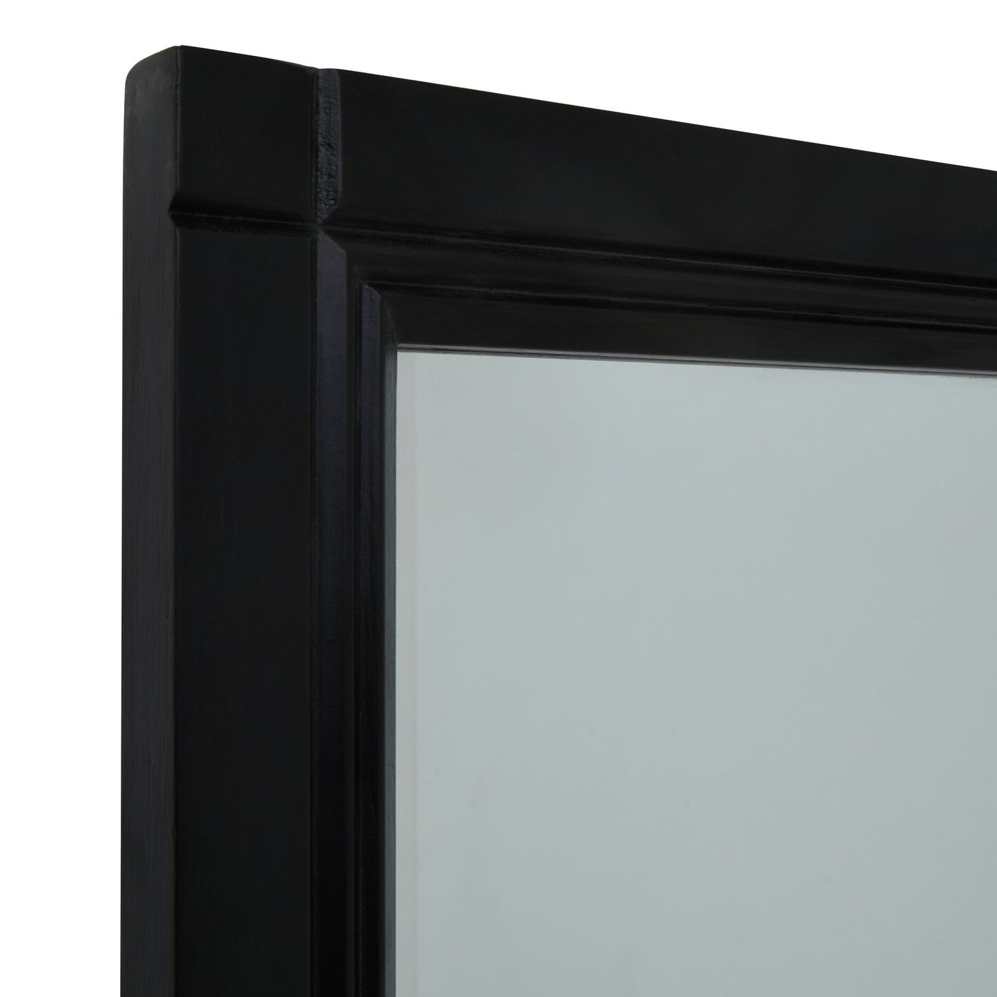 Close-up of a black framed mirror corner on a white background