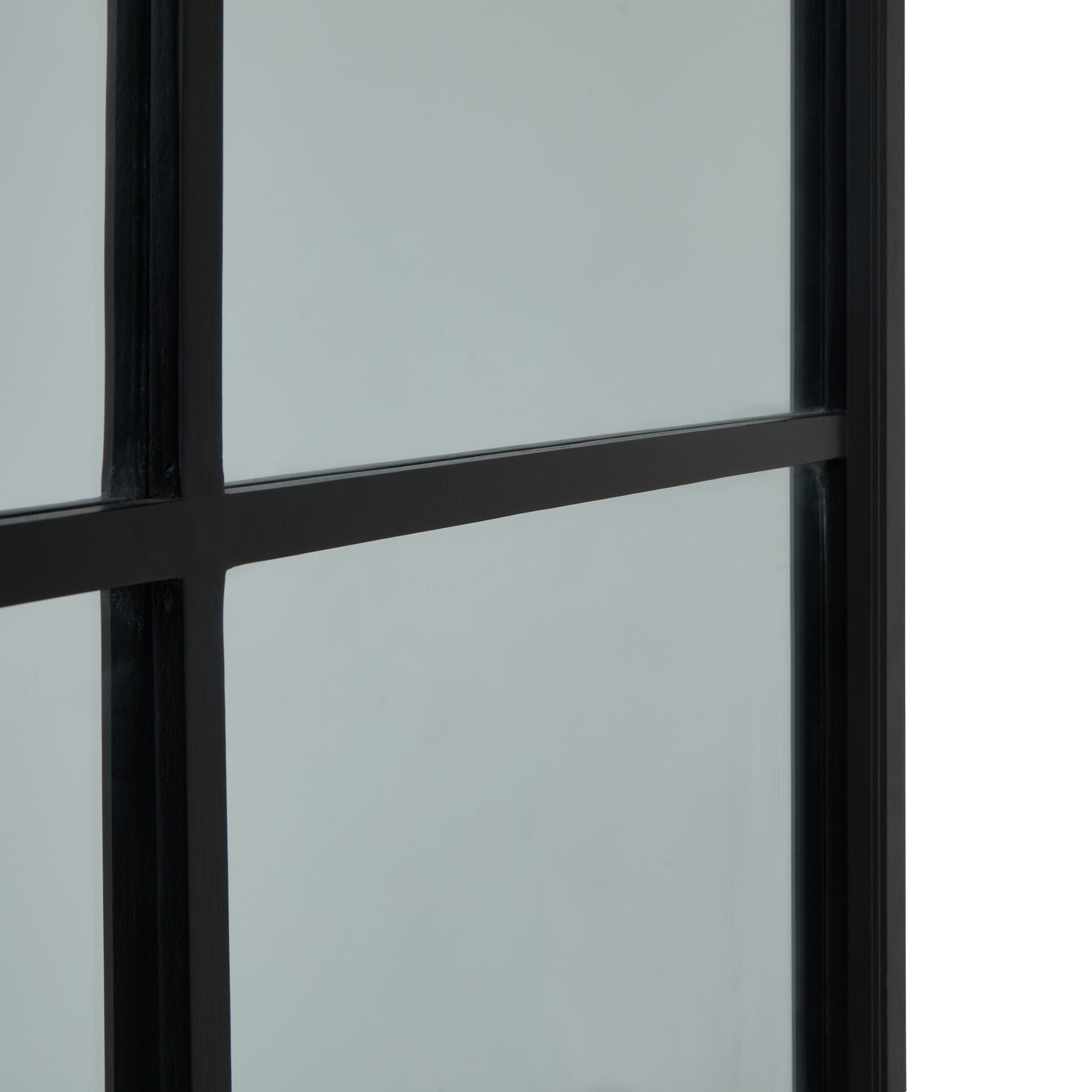 Window with black frame and glass panes on a white background