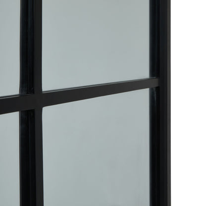 Window with black frame and glass panes on a white background