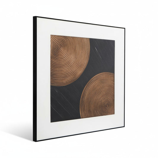 Framed artwork with concentric circular patterns on a white background