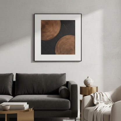 Modern living room with a gray sofa, round wooden coffee table, and abstract art on the wall.