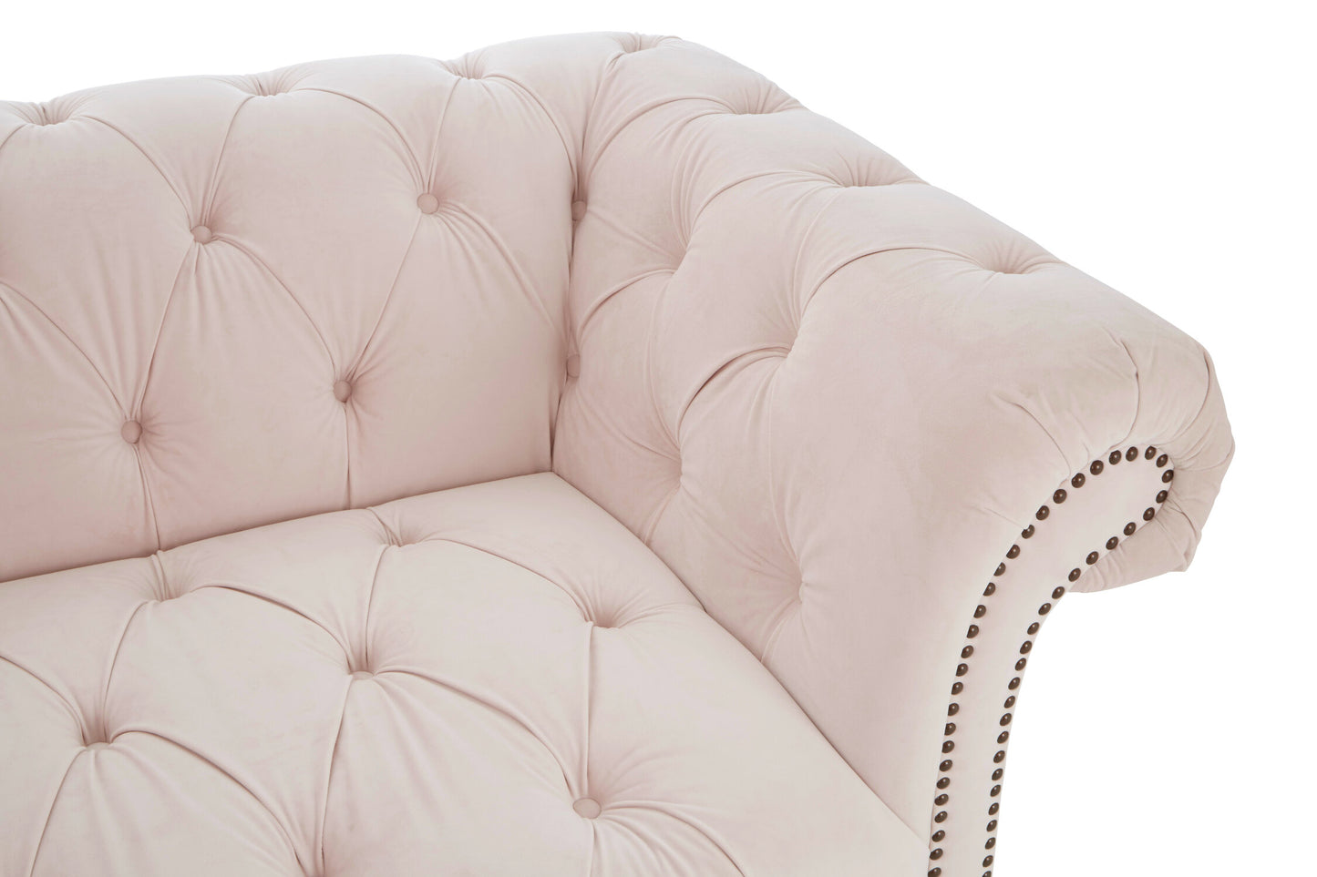 Pink tufted sofa with decorative nailhead trim on a white background