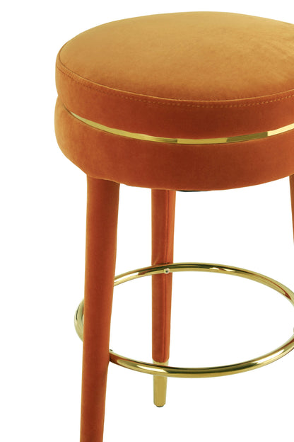 Orange bar stool with gold accents on a white background