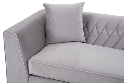 Gray sofa with a cushion on a white background