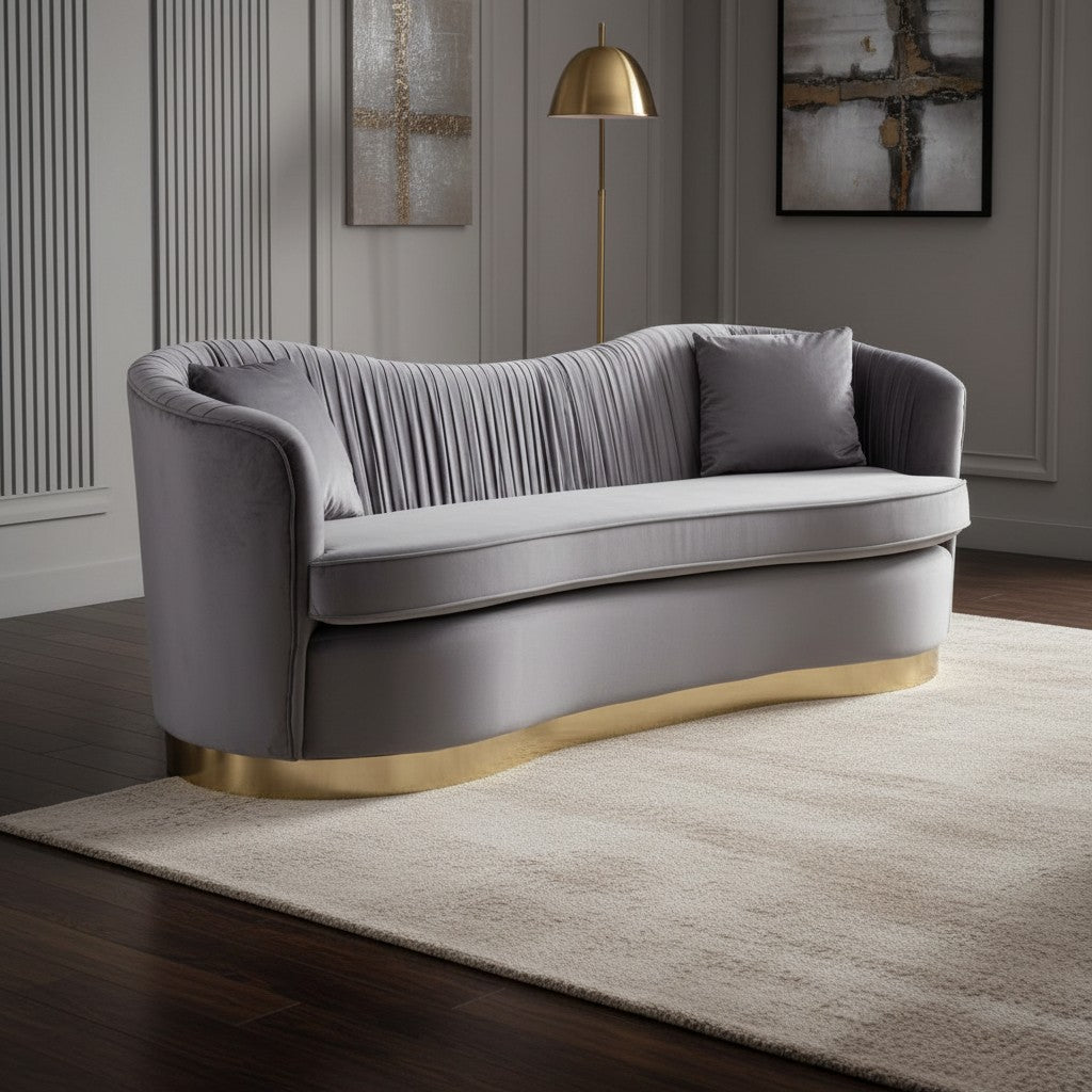 Gray sofa with gold accents in a stylish room