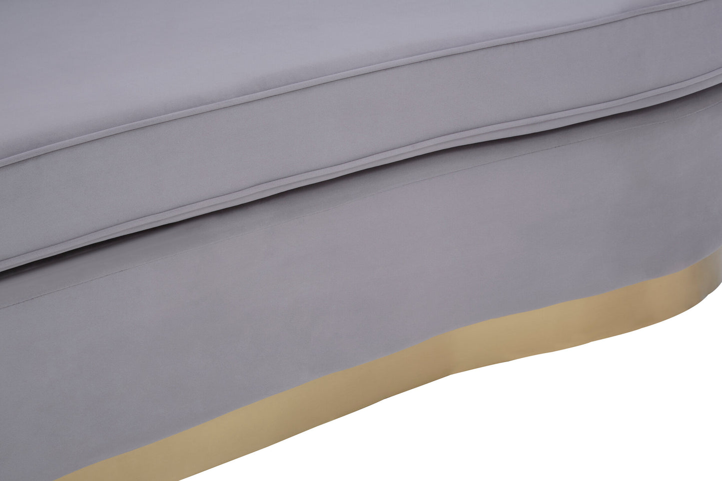 Close-up of a gray upholstered chair with a gold base on a white background