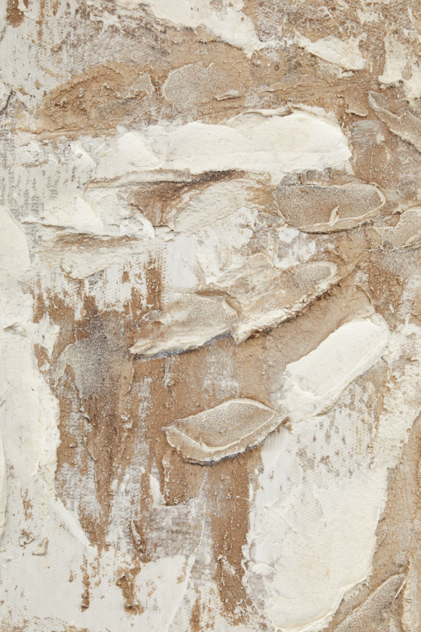 Textured beige and brown surface with abstract patterns