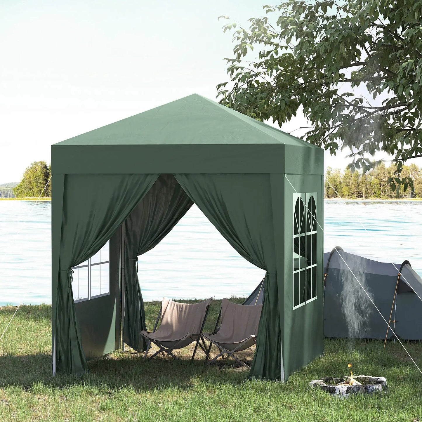 Green outdoor canopy tent with curtains and chairs near a body of water.