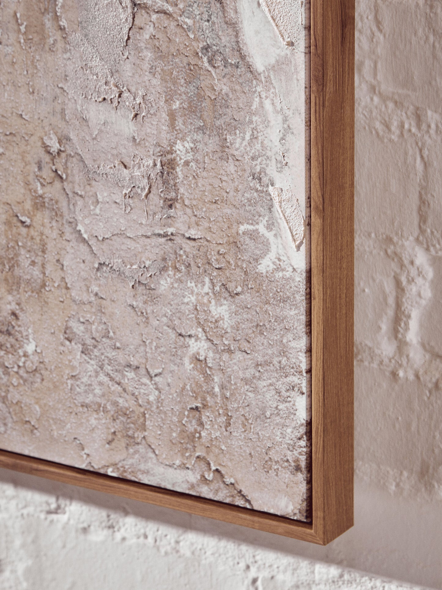 Close-up of a textured wall with a wooden frame