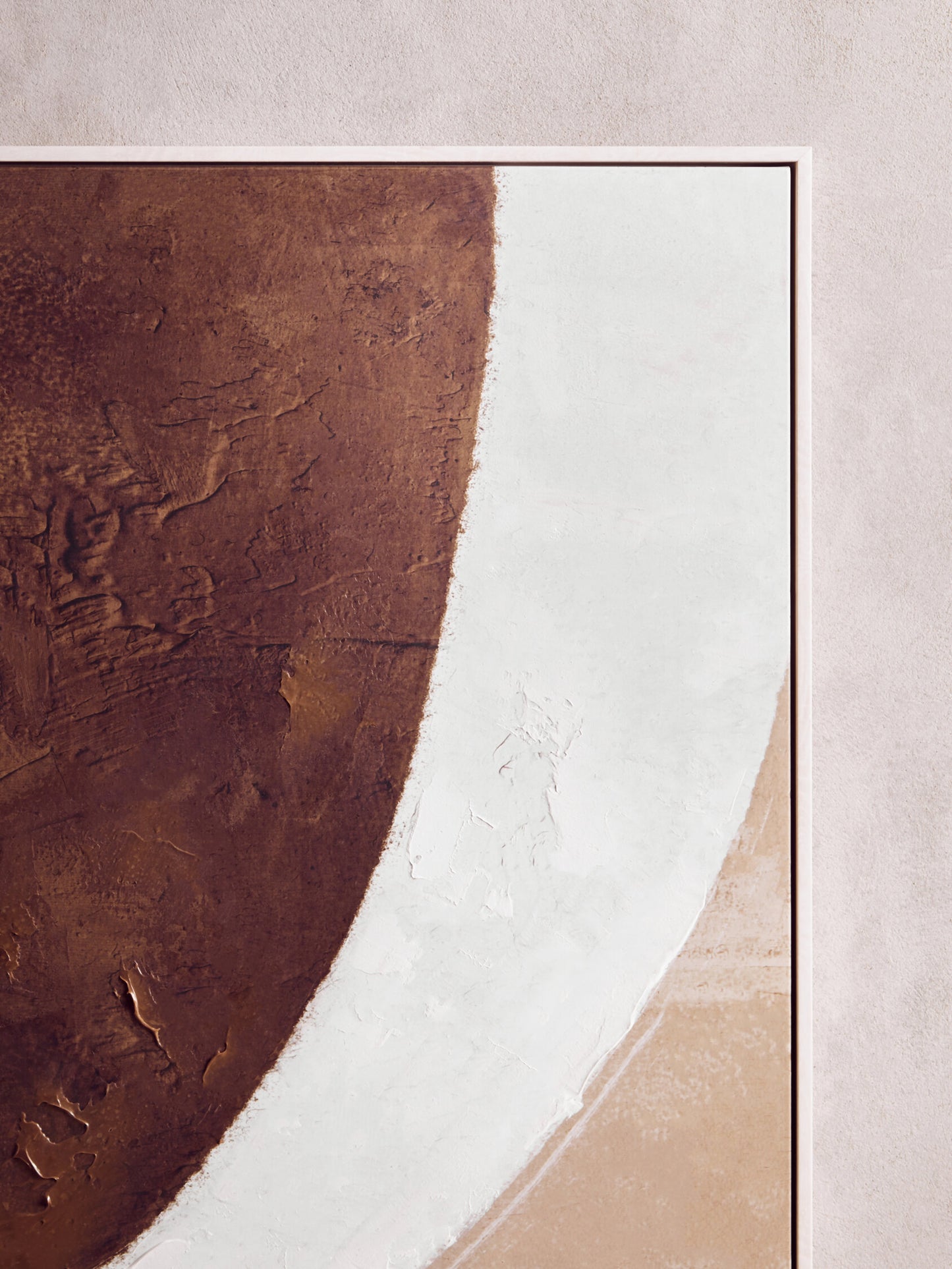 Abstract art piece with brown, white, and beige colors on a textured surface.