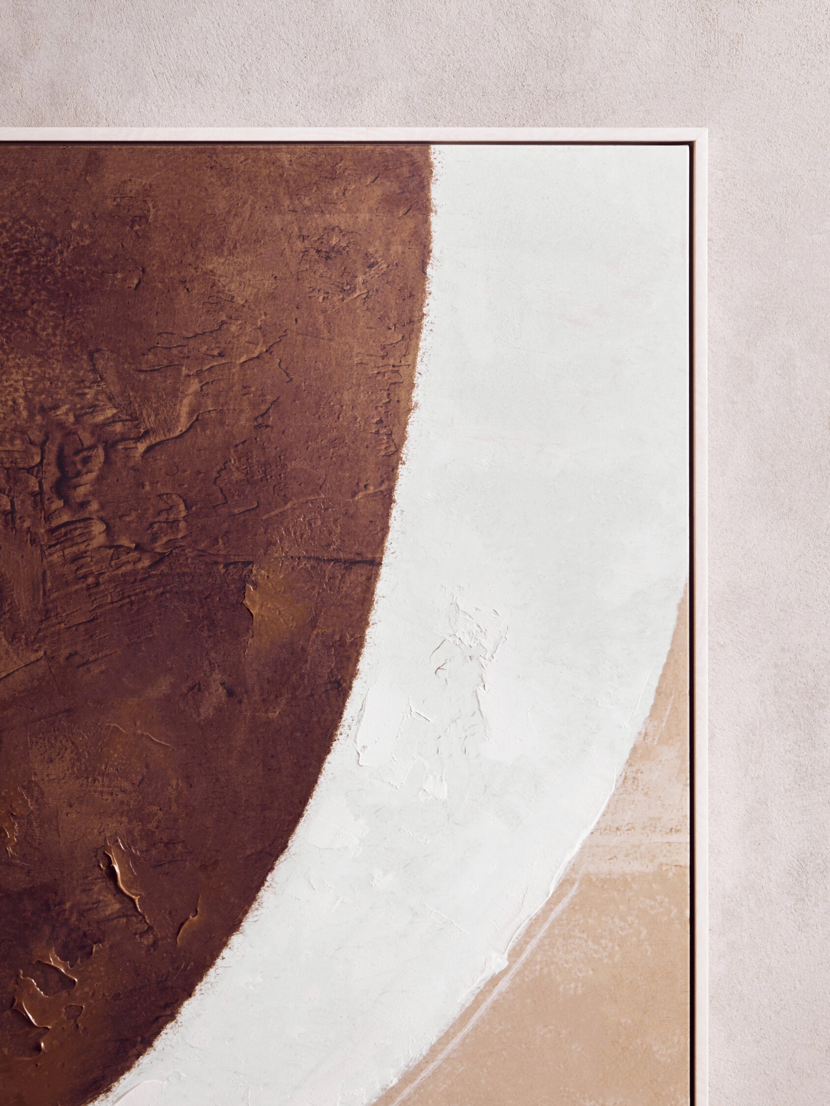 Abstract art piece with brown, white, and beige colors on a textured surface.