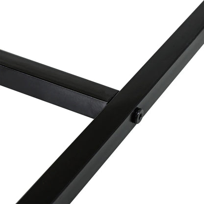 Close-up of a black metal frame on a white background