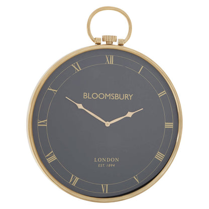 Wall clock with gold frame and 'Bloomsbury London' branding on a white background