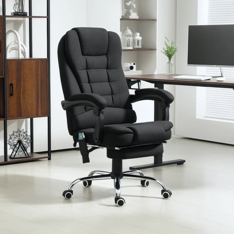 Black office chair with ottoman in a modern office setting