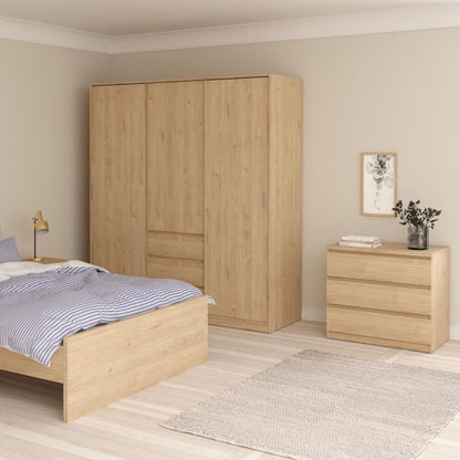 Wooden bedroom furniture set with wardrobe and nightstand in a room.