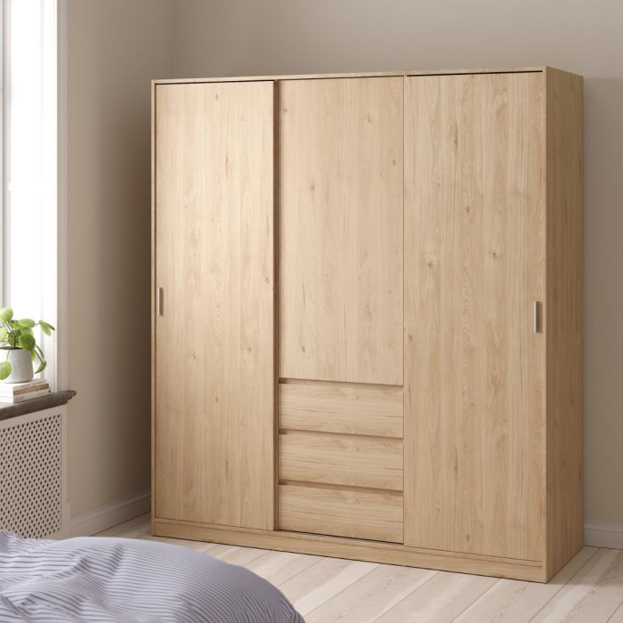 Wooden wardrobe with sliding doors in a bedroom setting