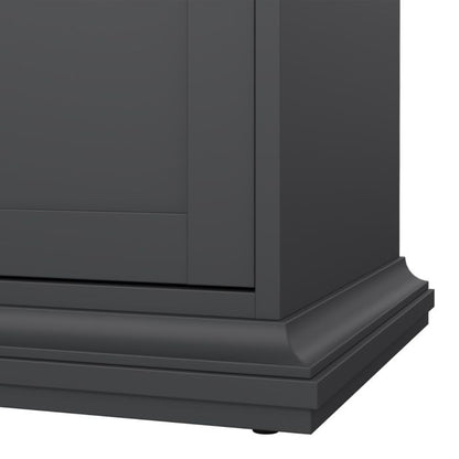 Close-up of a black cabinet corner with a white background