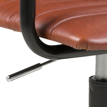 Brown leather office chair with black metal armrest and base on a white background