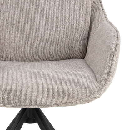 Close-up of a gray upholstered chair with a black metal base on a white background