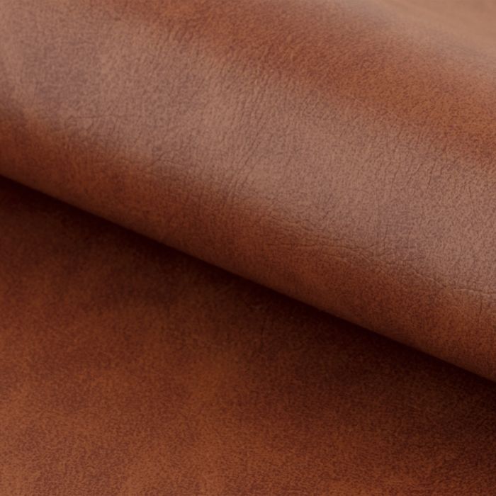 Close-up of brown fabric with a soft texture