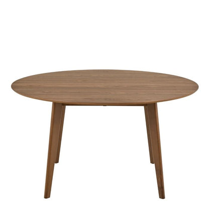 Round wooden table on a white background