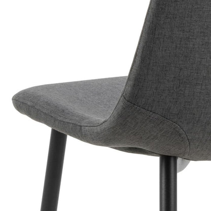 Gray upholstered chair with black legs on a white background