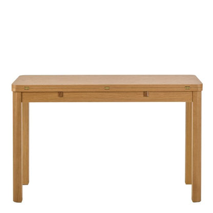 Wooden dining table on a white background