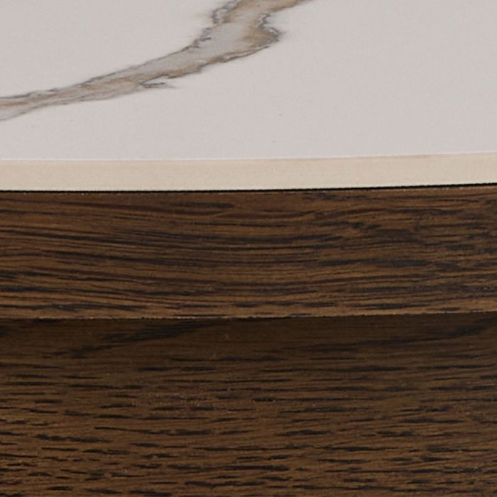 Close-up of a wooden surface with a white marble-like pattern above it.