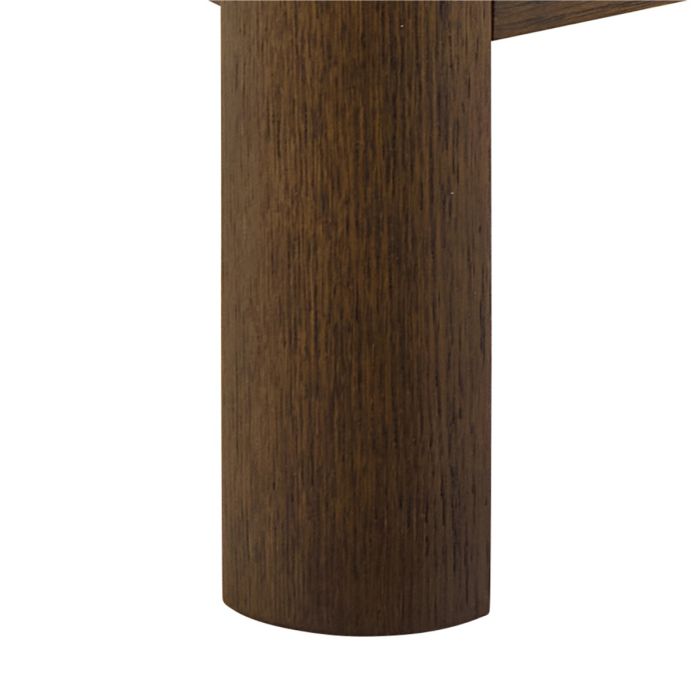 Close-up of a wooden leg on a white background