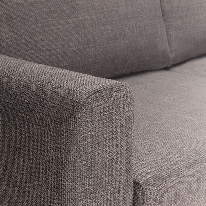 Close-up of a gray fabric sofa corner