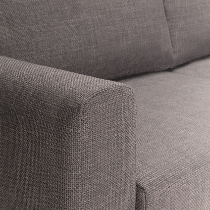Close-up of a gray fabric sofa corner