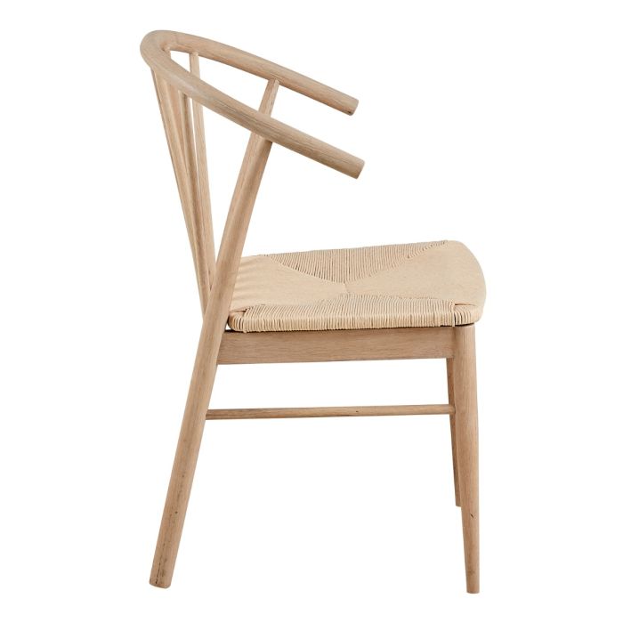 Wooden chair with woven seat on a white background