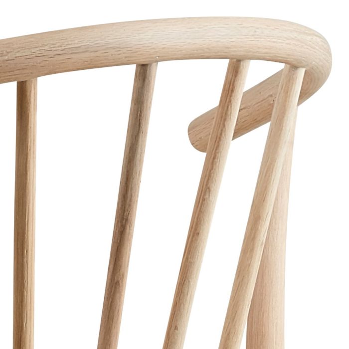 Close-up of a wooden chair with a white background