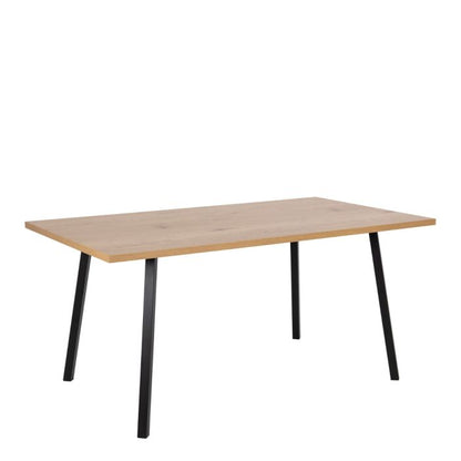 Wooden table with black legs on a white background