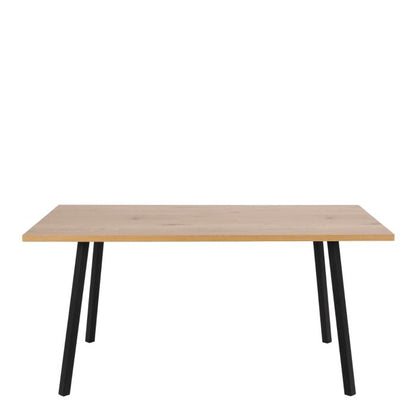 Wooden table with black legs on a white background