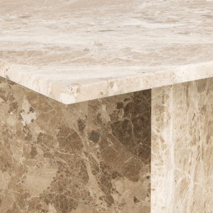 Close-up of a marble table with a beige and brown pattern.