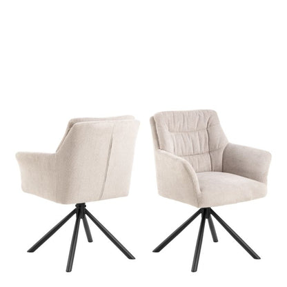 Two beige armchairs with black metal legs on a white background